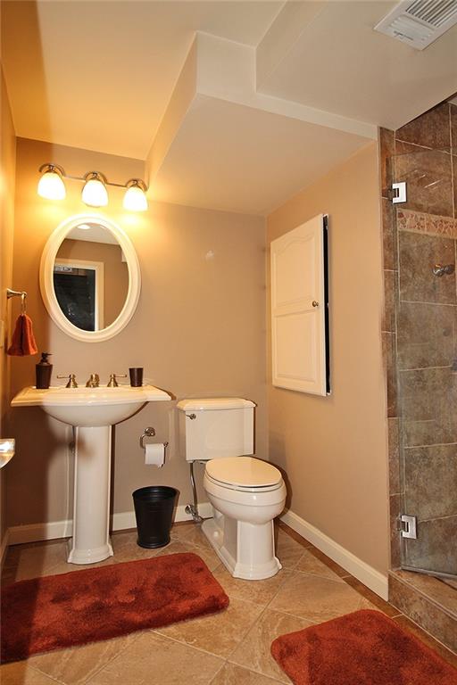 Undisclosed Address Cecil, PA 15321 - Photo 14 of 29 a bathroom with a sink and a mirror