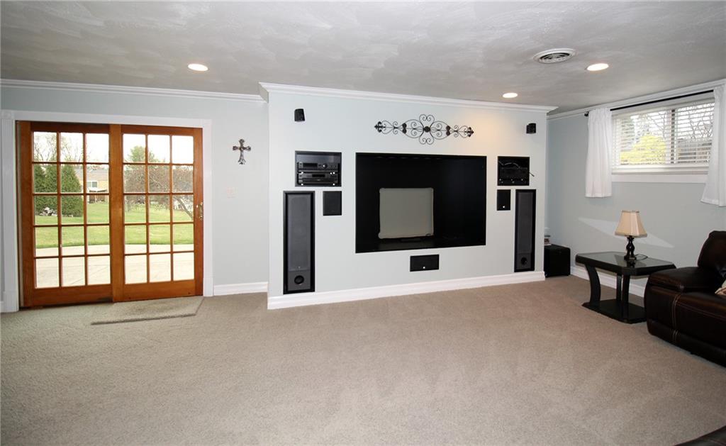 Undisclosed Address Cecil, PA 15321 - Photo 18 of 29 a view of an empty room with a window and a flat screen tv