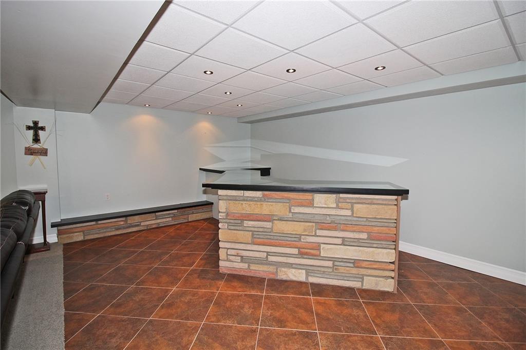 Undisclosed Address Cecil, PA 15321 - Photo 20 of 29 a view of a room with racks on the wall