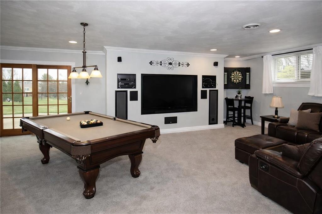 Undisclosed Address Cecil, PA 15321 - Photo 21 of 29 a living room with furniture and a flat screen tv
