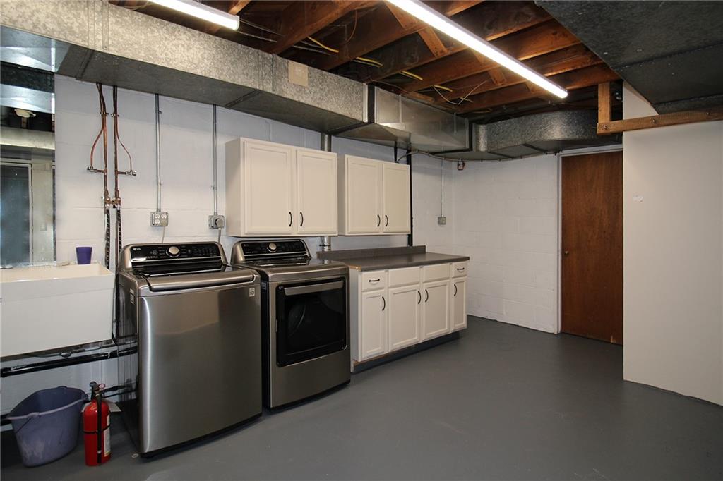 Undisclosed Address Cecil, PA 15321 - Photo 23 of 29 a kitchen with a sink cabinets and stainless steel appliances