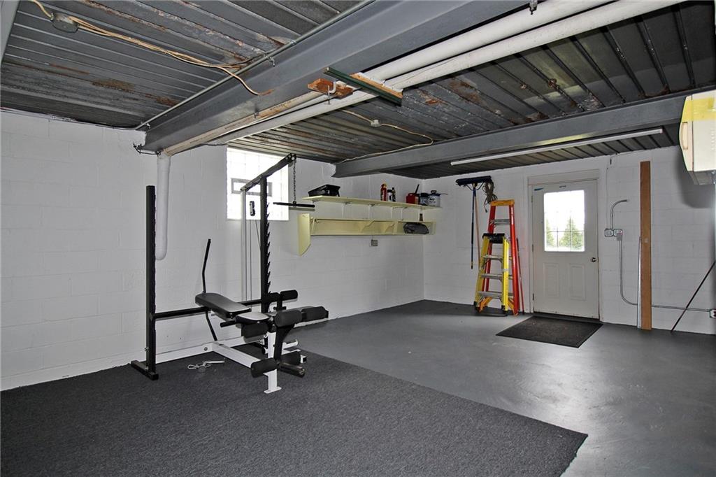 Undisclosed Address Cecil, PA 15321 - Photo 25 of 29 a view of a room with gym equipment