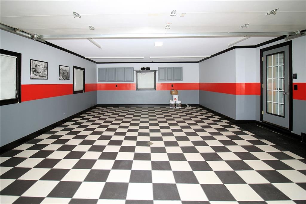Undisclosed Address Cecil, PA 15321 - Photo 26 of 29 a room with black and white checkered floor