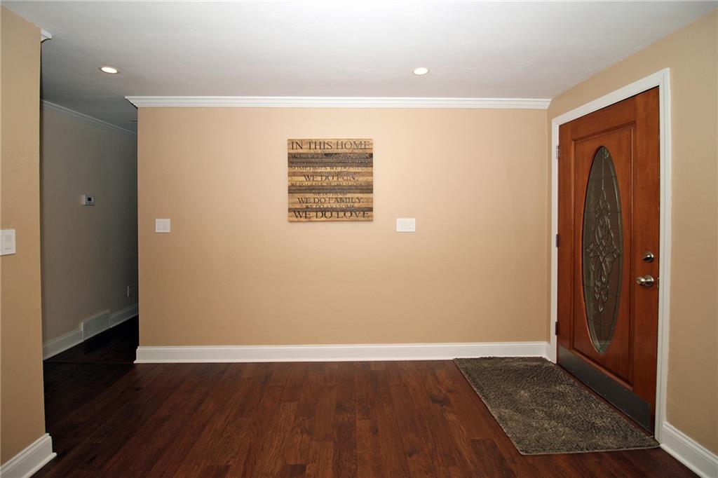 Undisclosed Address Cecil, PA 15321 - Photo 4 of 29 an empty room with wooden floor and closet