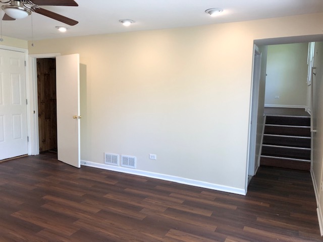 624 Quail Run Road Matteson, IL 60443 - Photo 20 of 30 an empty room with wooden floor