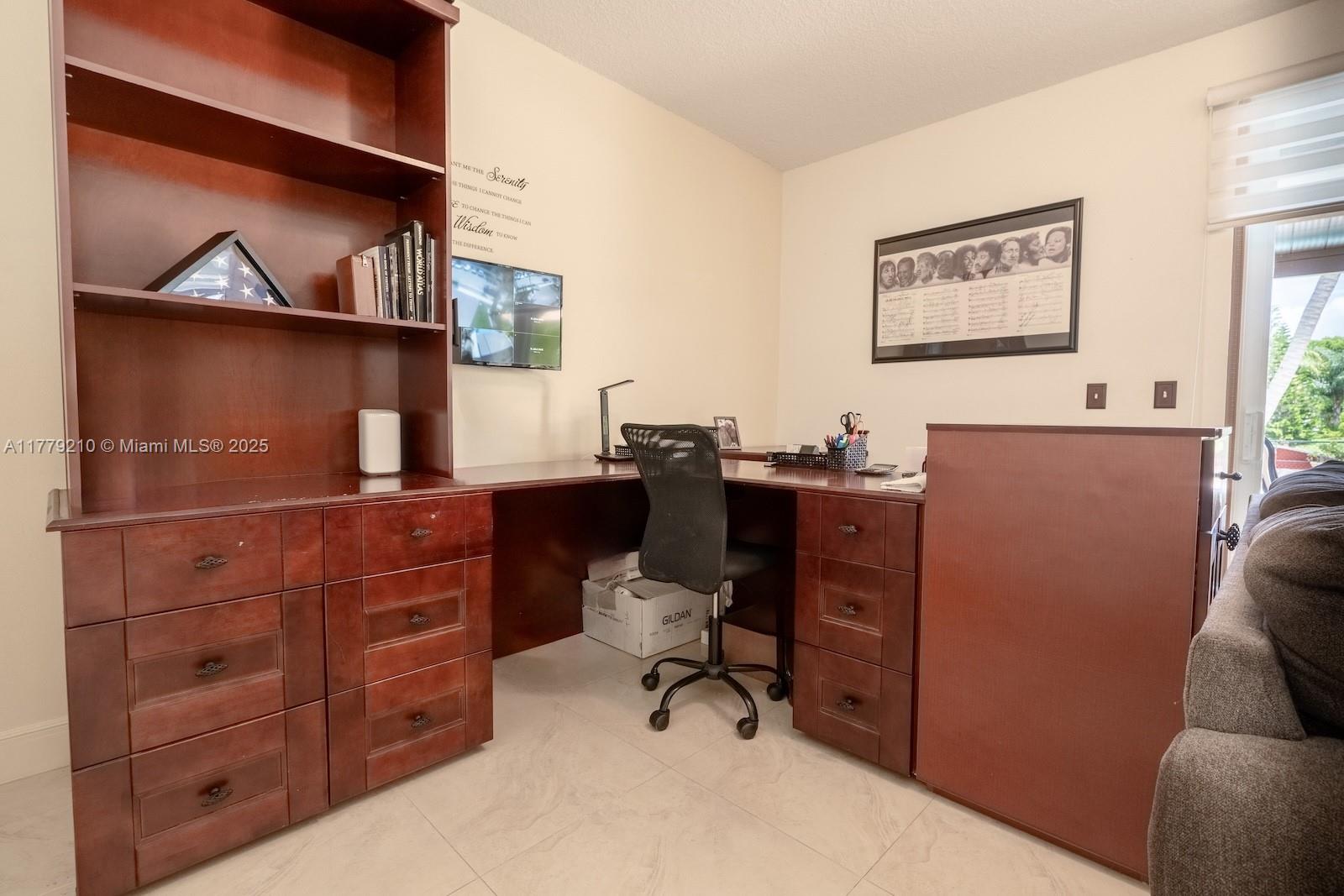 Towngate Pembroke Pines, FL 33028 - Photo 11 of 41 a room with cabinets and furniture