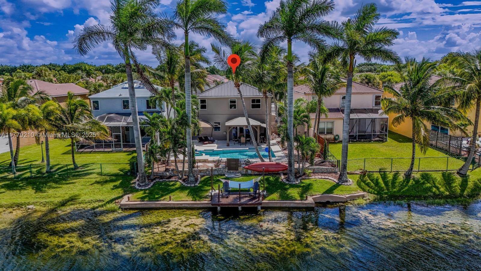 Towngate Pembroke Pines, FL 33028 - Photo 2 of 41 front view of a house with a yard