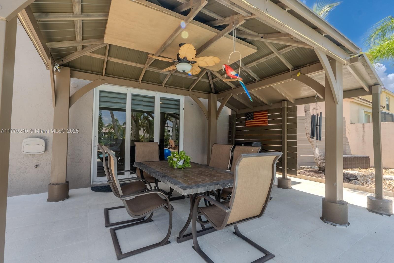 Towngate Pembroke Pines, FL 33028 - Photo 28 of 41 a view of a patio with table and chairs