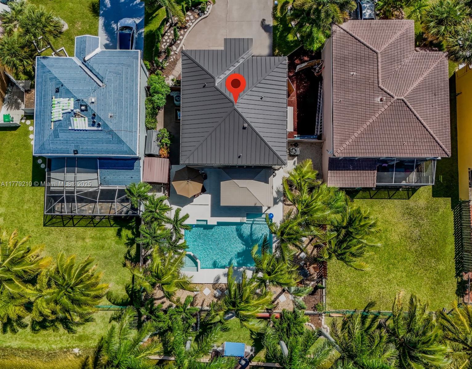 Towngate Pembroke Pines, FL 33028 - Photo 41 of 41 a aerial view of a house with a yard and potted plants