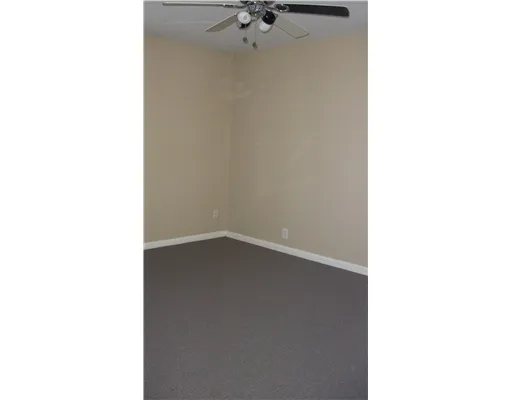 a black and white photo of a living room