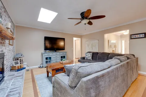 a bed room with a bed and a chandelier