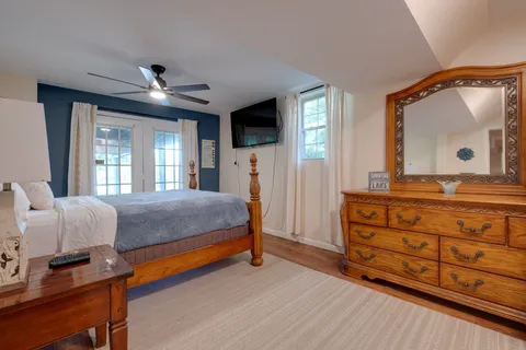 a bathroom with a toilet and shower