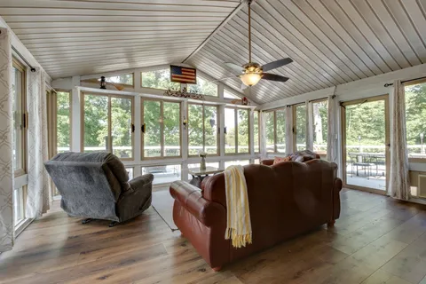 a view of outdoor space with a garden and trees
