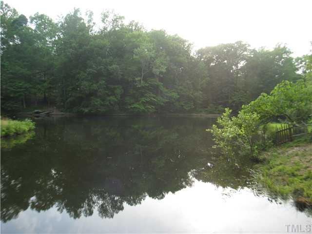 14405 Possum Track Road Raleigh, NC 27614 - Photo 3 of 25 a picture of the lake from the dock