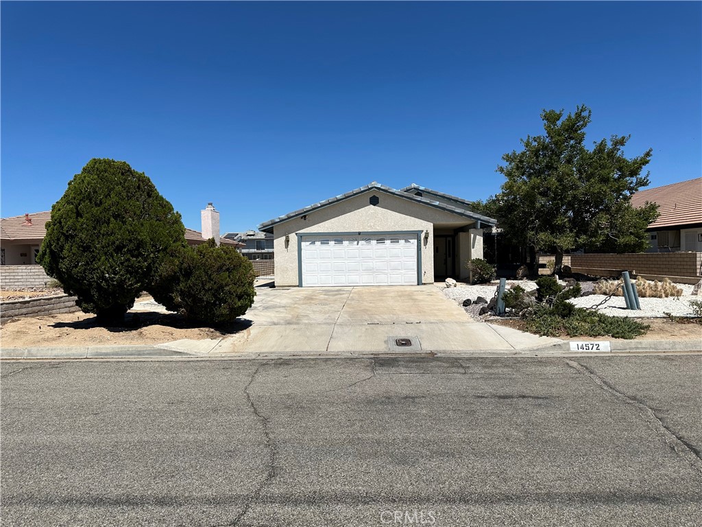 14572 Lighthouse Lane Helendale, CA 92342 - Photo 1 of 24 a view of a house with a yard