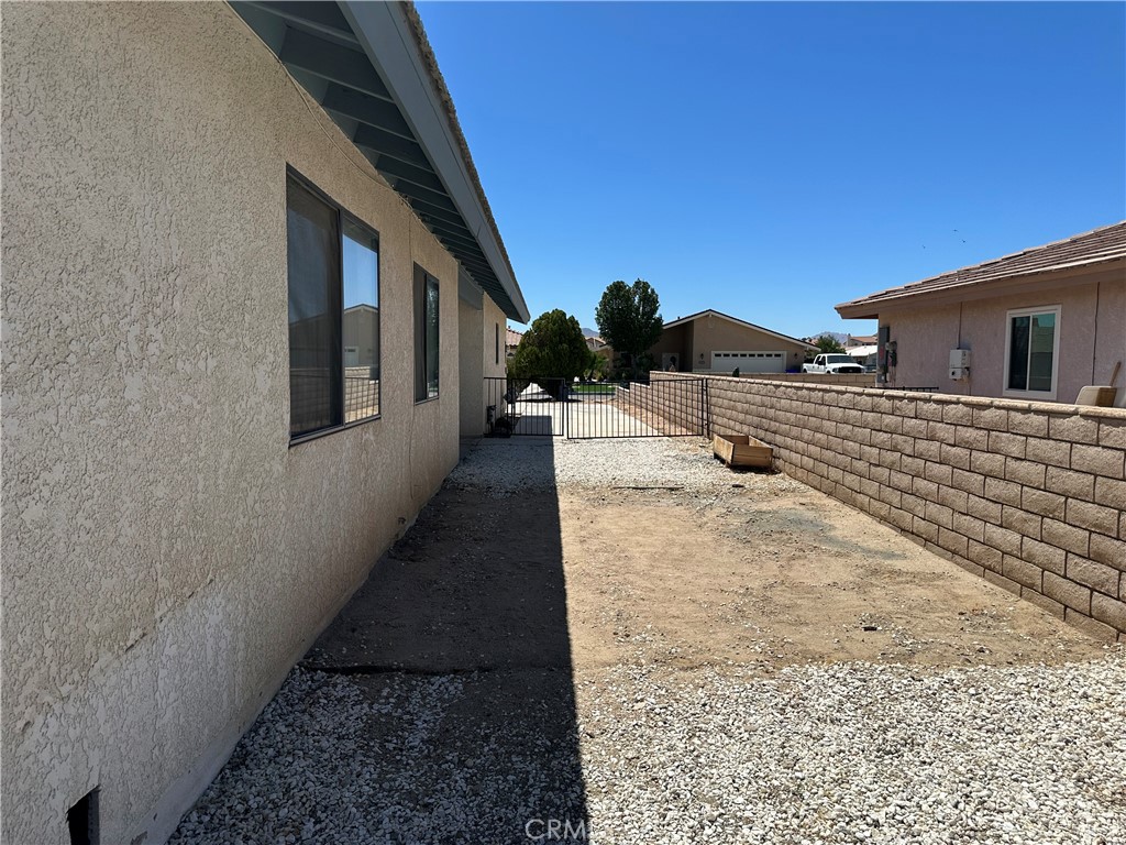 14572 Lighthouse Lane Helendale, CA 92342 - Photo 18 of 24 a view of a back yard of the house