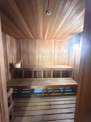 a view of a swimming pool with a lounge chairs