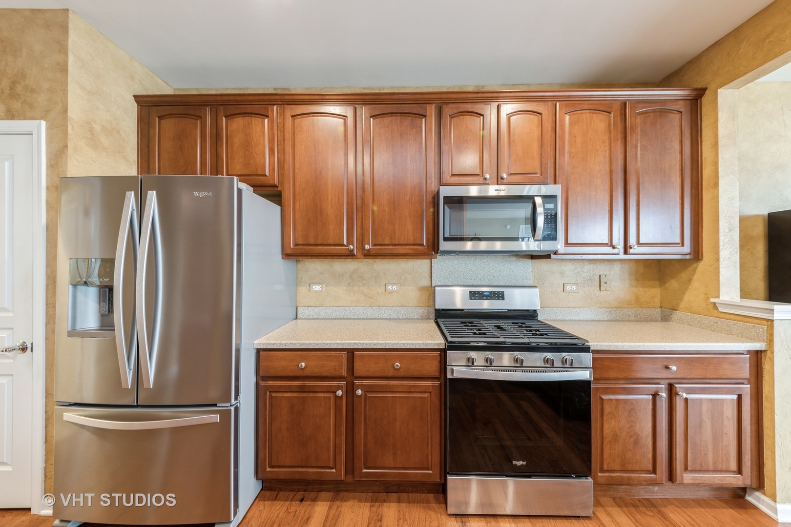 2795 Beacon Point Circle Elgin, IL 60124 - Photo 12 of 28 a kitchen with stainless steel appliances granite countertop a refrigerator stove and sink