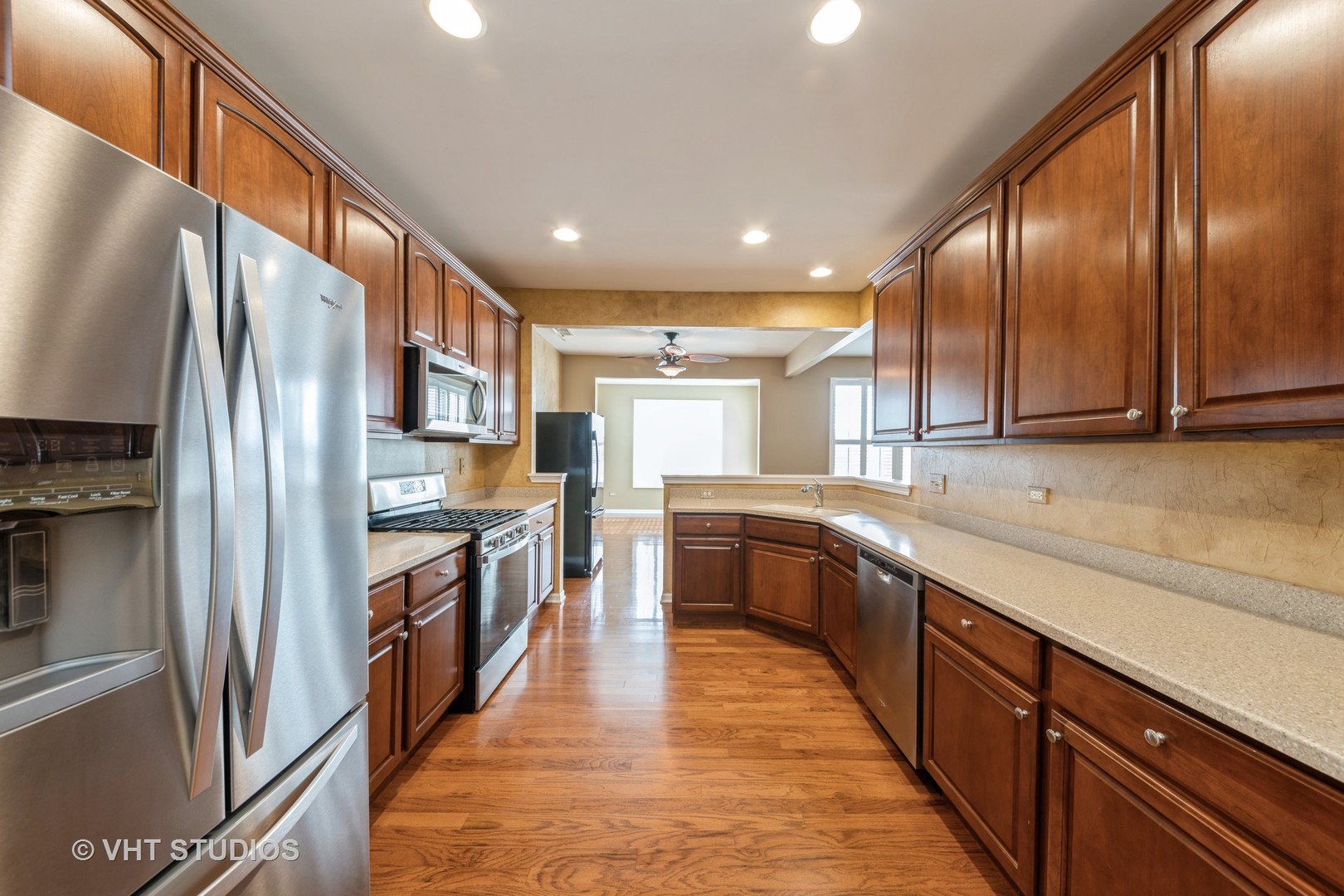 2795 Beacon Point Circle Elgin, IL 60124 - Photo 15 of 28 a large kitchen with stainless steel appliances lots of counter top space