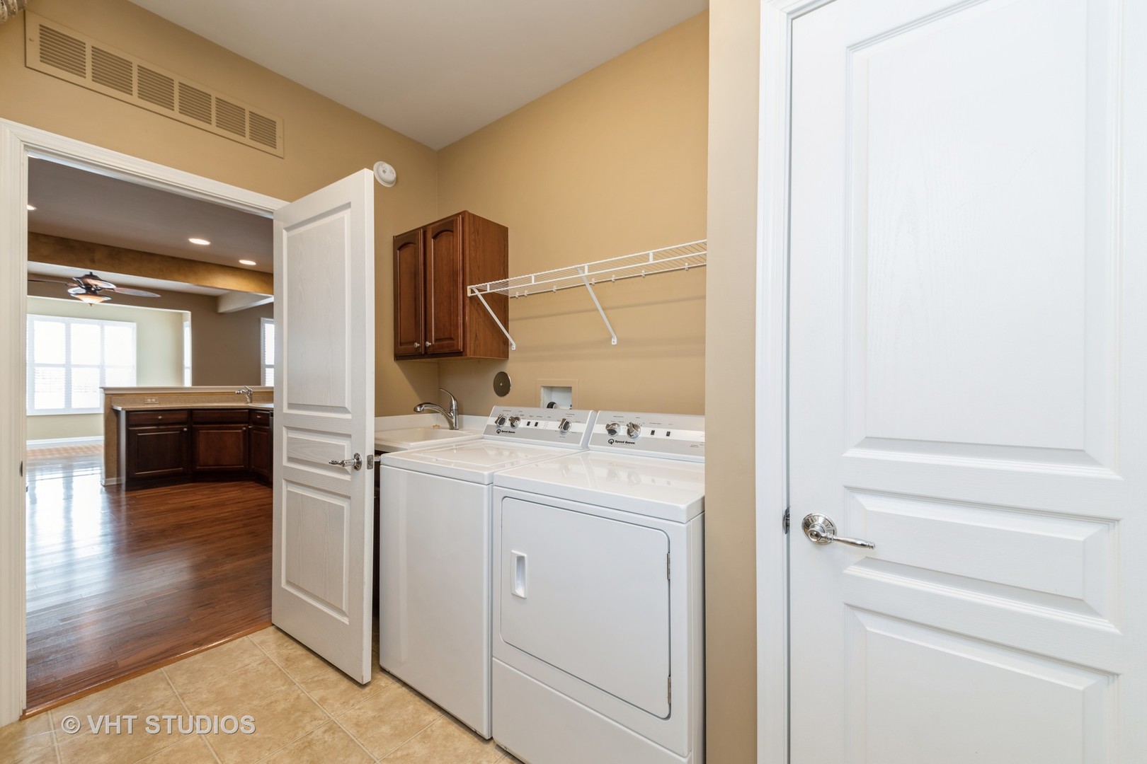 2795 Beacon Point Circle Elgin, IL 60124 - Photo 17 of 28 a view of hallway with washer and dryer