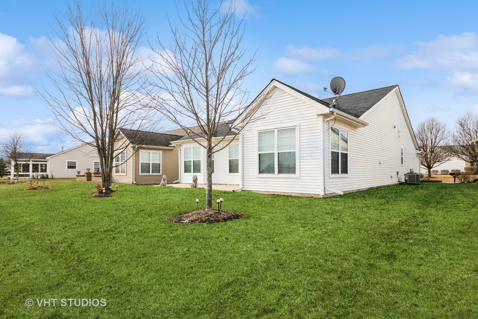 2795 Beacon Point Circle Elgin, IL 60124 - Photo 25 of 28 a view of a house with a backyard