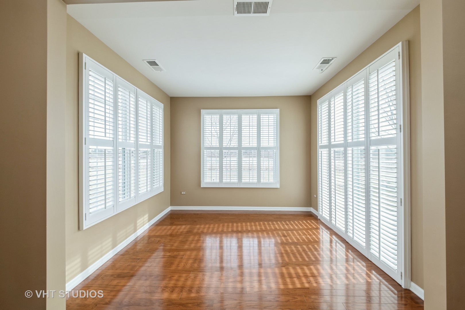 2795 Beacon Point Circle Elgin, IL 60124 - Photo 10 of 28 a view of an empty room with glass windows