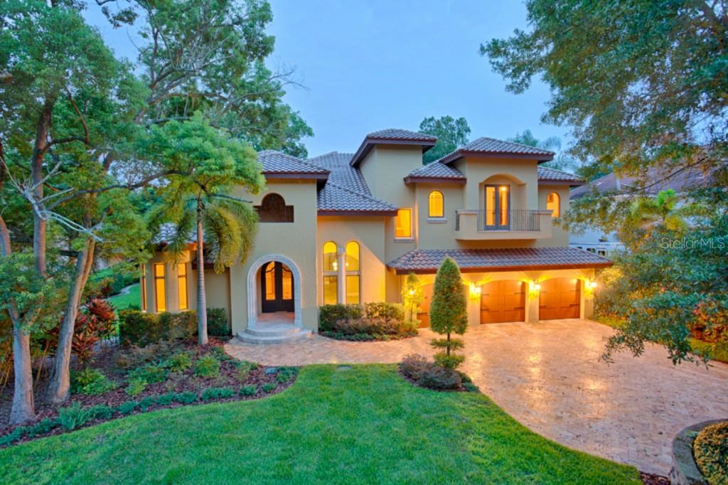 415 Butler Street Windermere, FL 34786 - Photo 1 of 1 a front view of a house with garden
