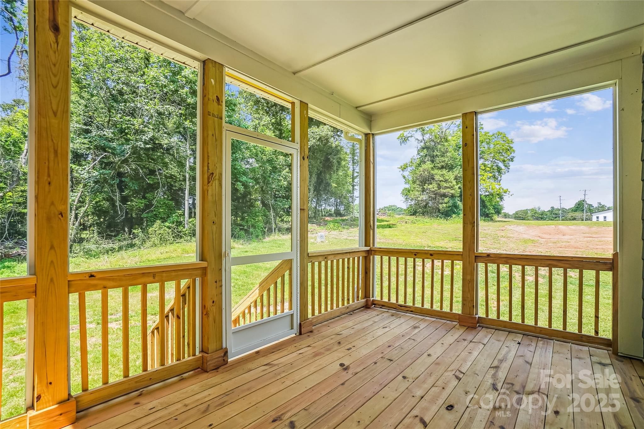 522 Fern Hill Road, Unit 17 Mooresville, NC 28117 - Photo 8 of 16 a view of a balcony with wooden floor