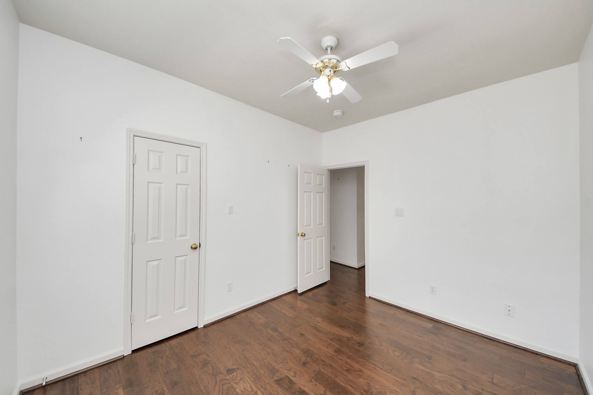 5815 Pheasant Ridge Lane Houston, TX 77041 - Photo 34 of 46 Bright and inviting room featuring hardwood floors, a ceiling fan, and ample natural light.