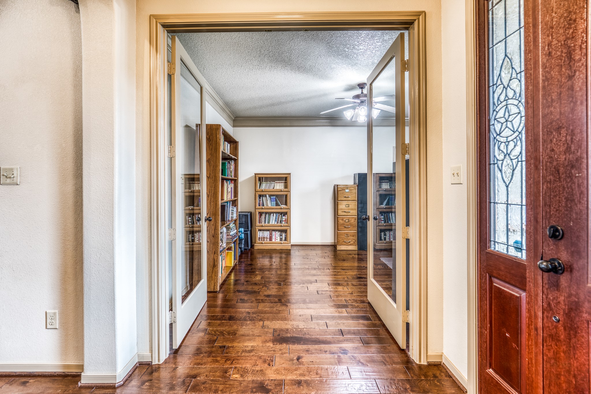 677 Grubbs Road Sealy, TX 77474 - Photo 15 of 40 a view of a hallway with wooden floor and staircase