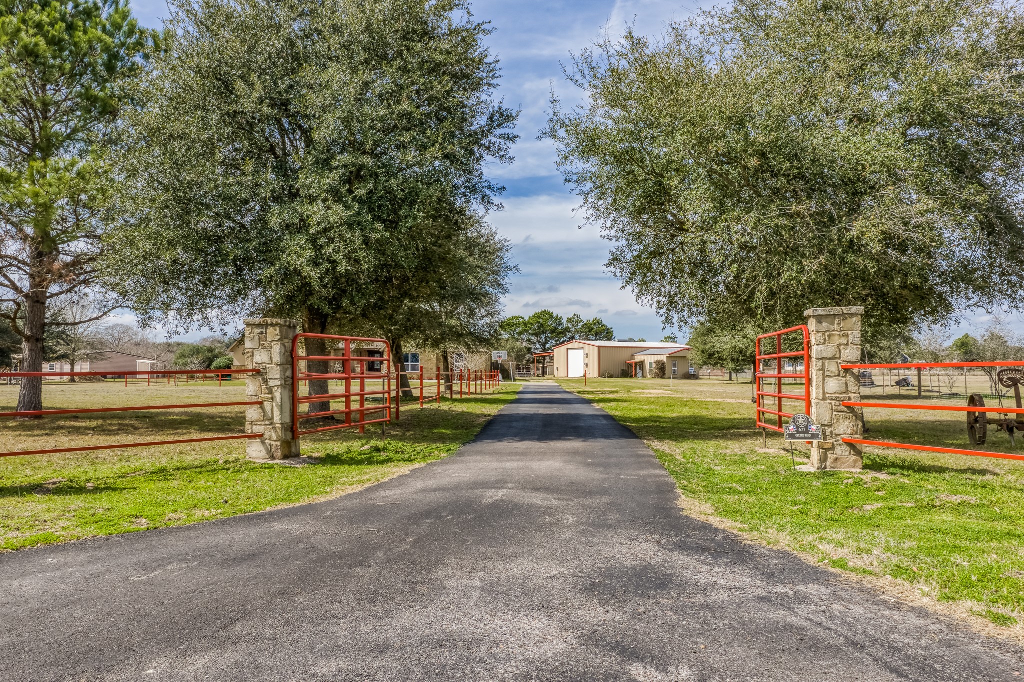 677 Grubbs Road Sealy, TX 77474 - Photo 2 of 40 a view of a park with large trees