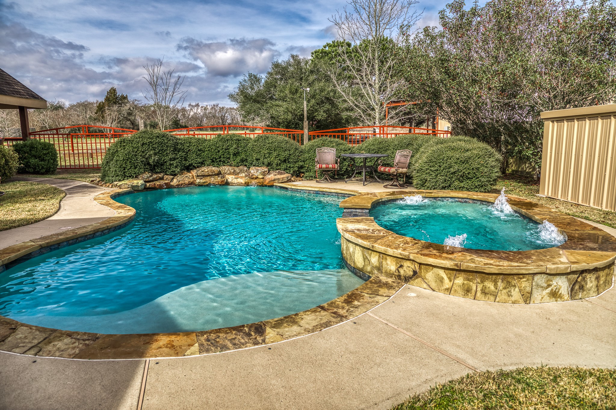 677 Grubbs Road Sealy, TX 77474 - Photo 24 of 40 a view of a swimming pool with a yard