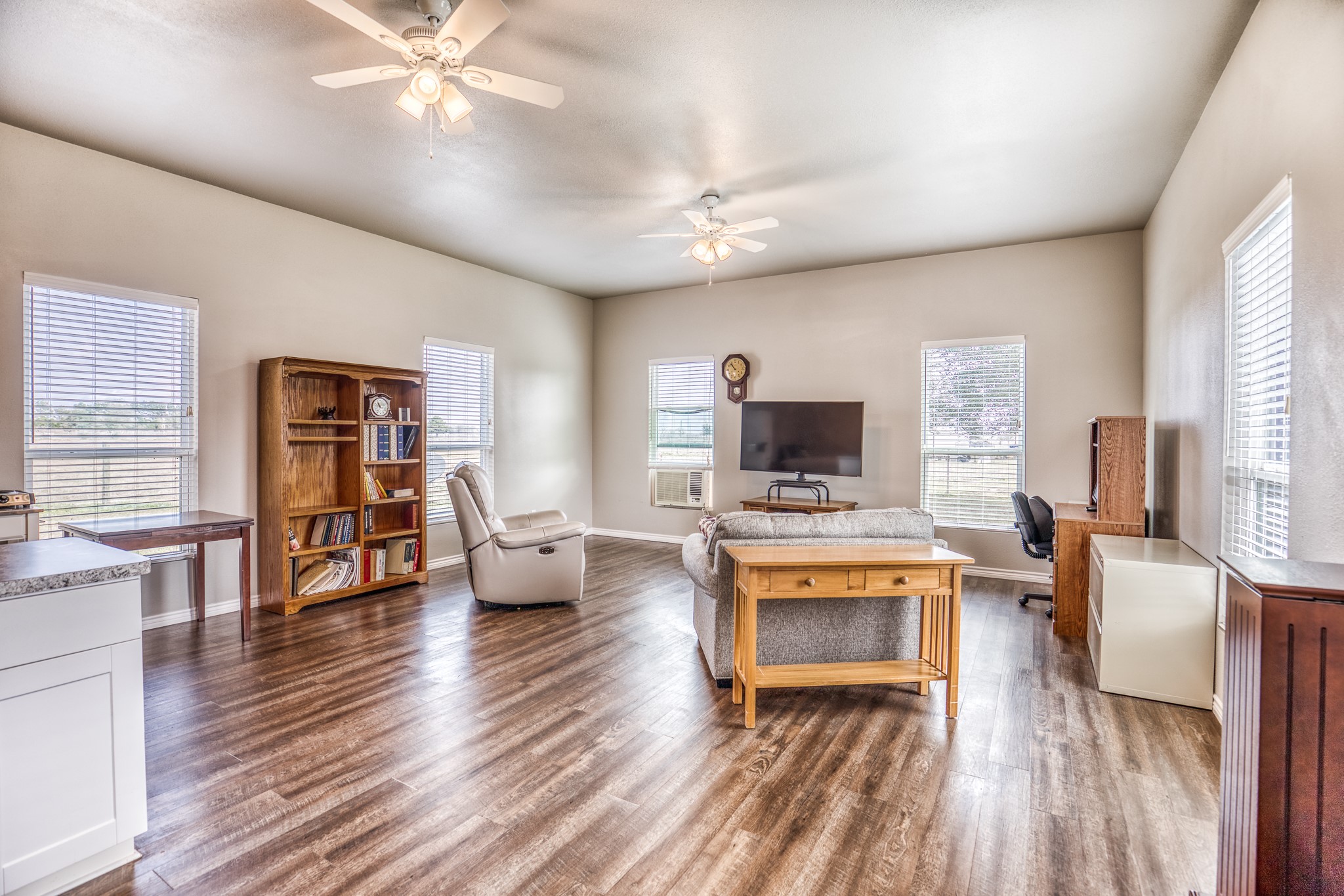 677 Grubbs Road Sealy, TX 77474 - Photo 32 of 40 a living room with furniture and a flat screen tv
