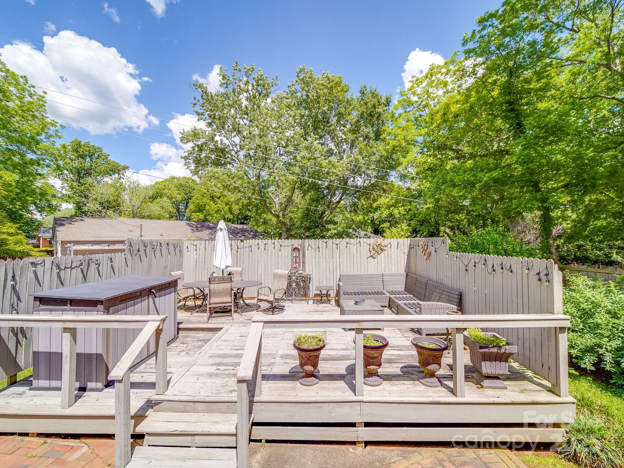 5411 Valley Forge Road Charlotte, NC 28210 - Photo 19 of 20 a view of house with patio outdoor seating