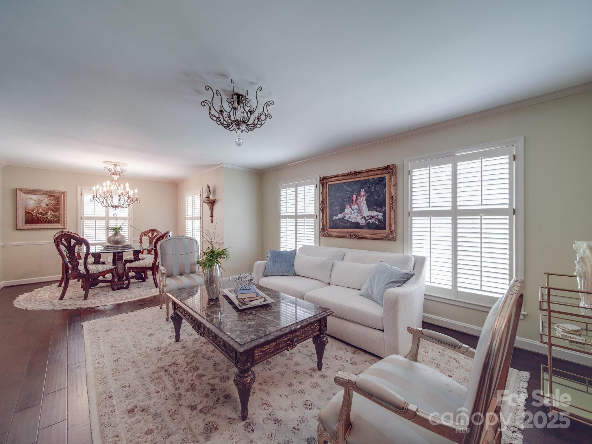 5411 Valley Forge Road Charlotte, NC 28210 - Photo 3 of 20 a living room with furniture two window and a table