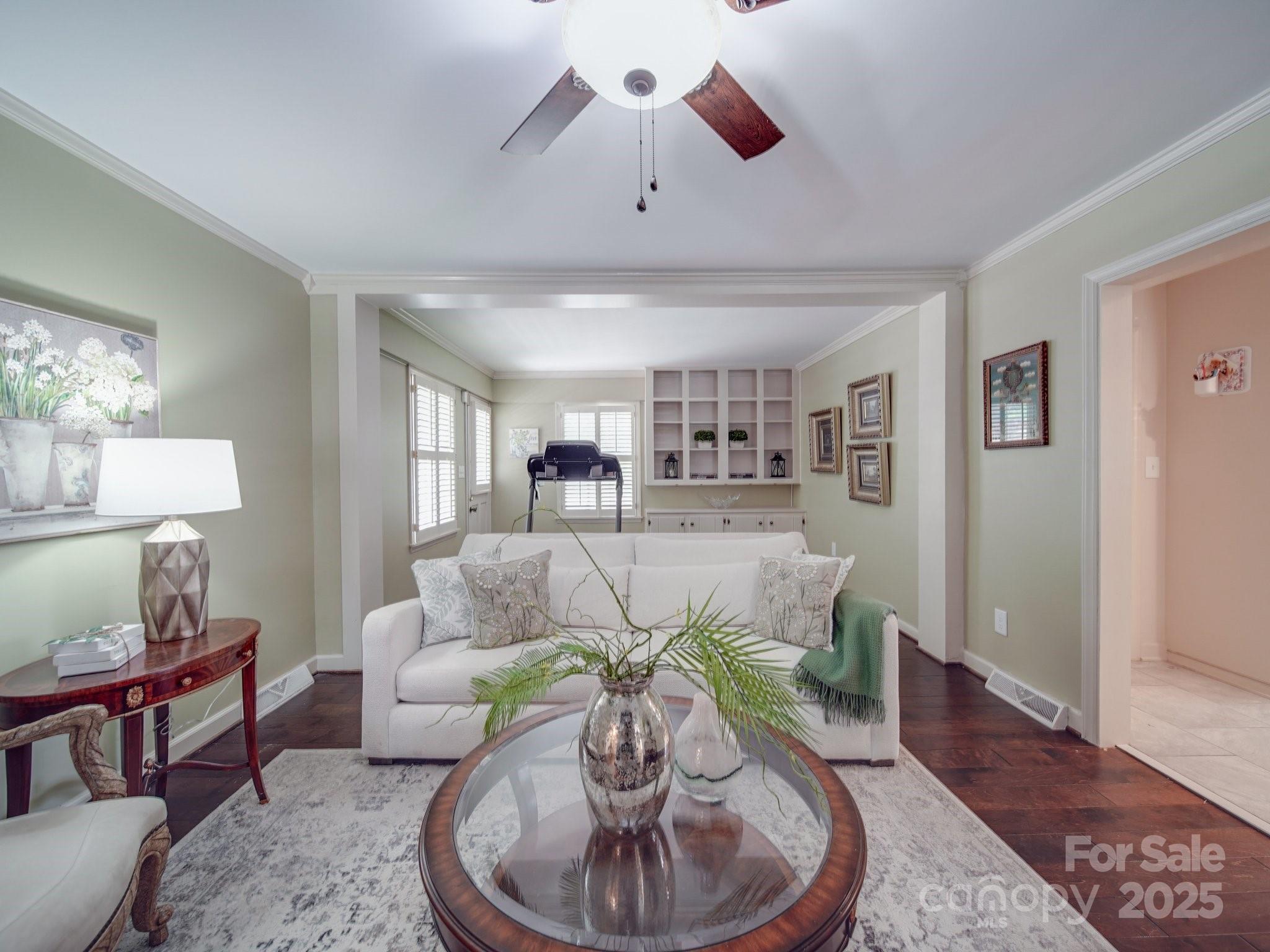 5411 Valley Forge Road Charlotte, NC 28210 - Photo 8 of 20 a living room with furniture and a chandelier