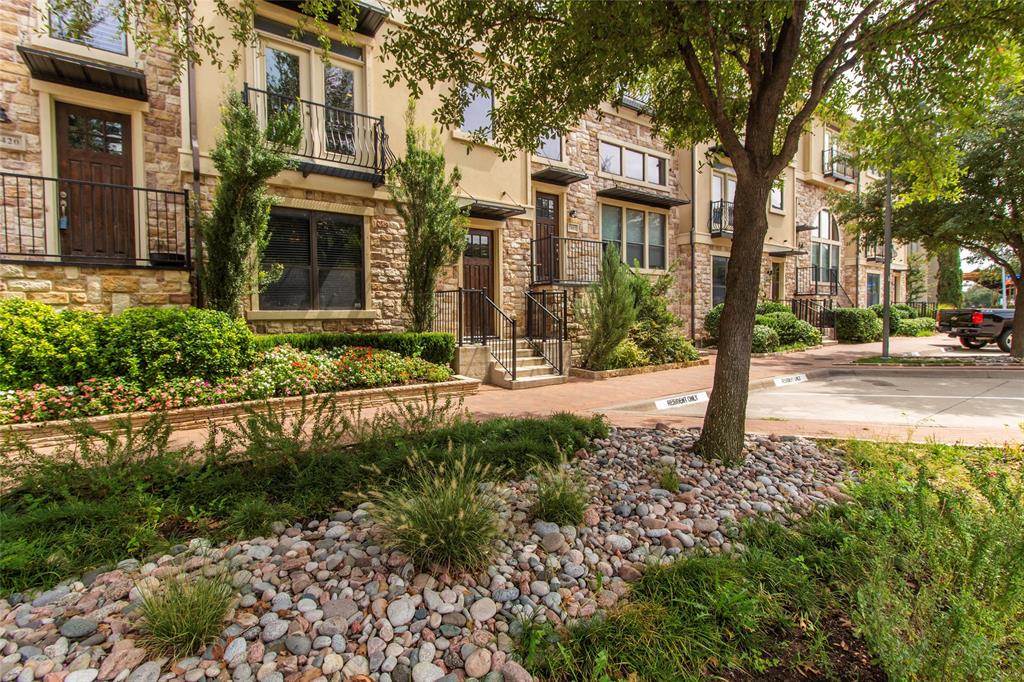 7416 Bishop Road Plano, TX 75024 - Photo 3 of 40 a view of a building with a yard and plants