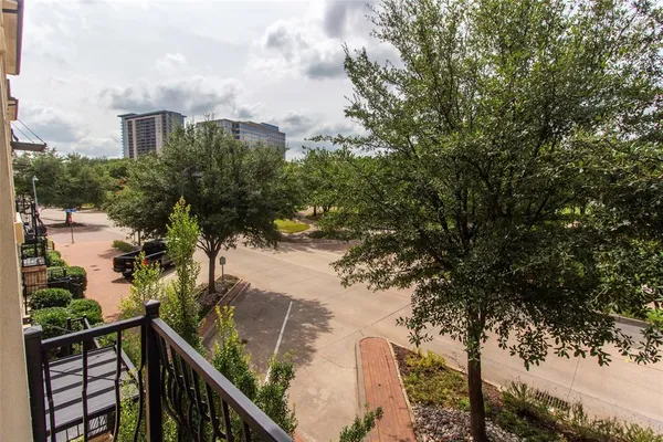 a view of a house in front of a yard