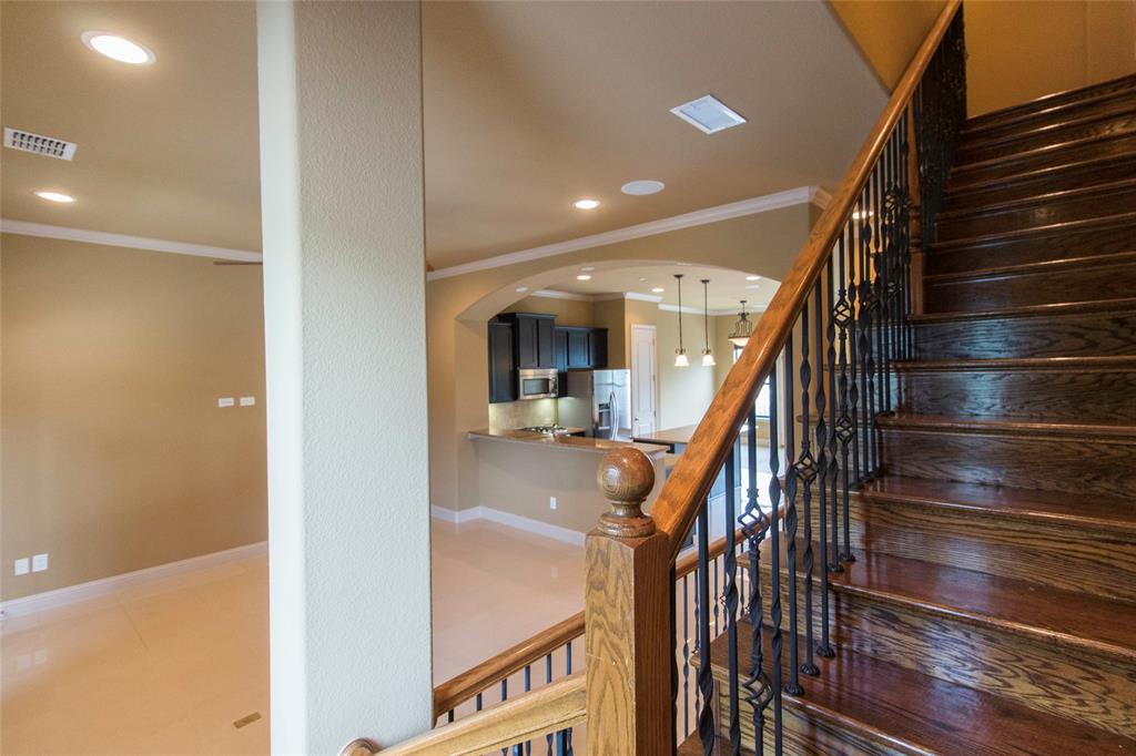 7416 Bishop Road Plano, TX 75024 - Photo 32 of 40 a view of entryway and hall with wooden floor