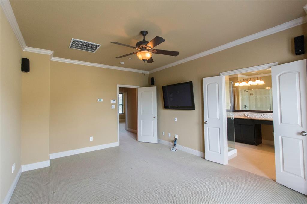 7416 Bishop Road Plano, TX 75024 - Photo 34 of 40 a view of a livingroom with a flat screen tv