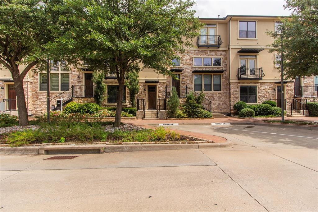 7416 Bishop Road Plano, TX 75024 - Photo 5 of 40 front view of a brick house with a yard