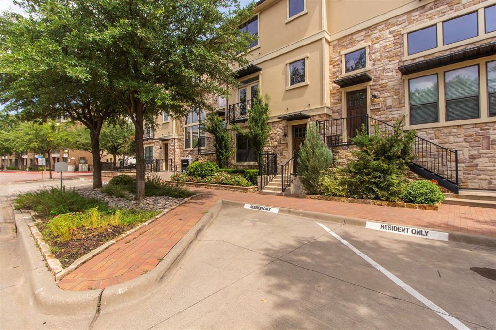 7416 Bishop Road Plano, TX 75024 - Photo 6 of 40 a view of a street with a building in the background