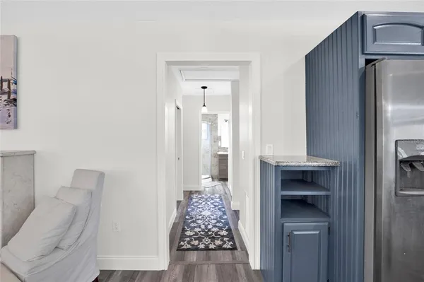 a view of livingroom with wooden floor
