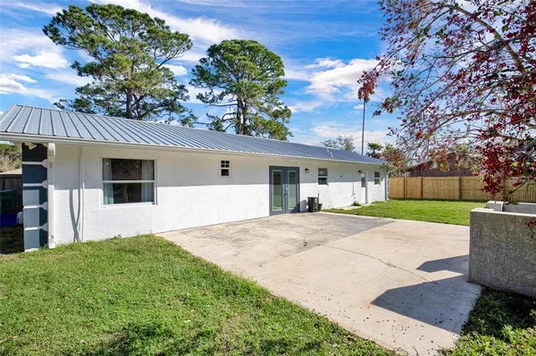 front view of a house with a big yard