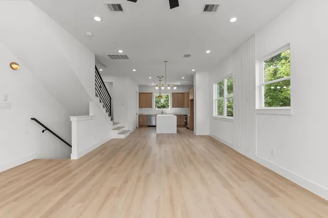 a bathroom with a sink a toilet and a bathtub