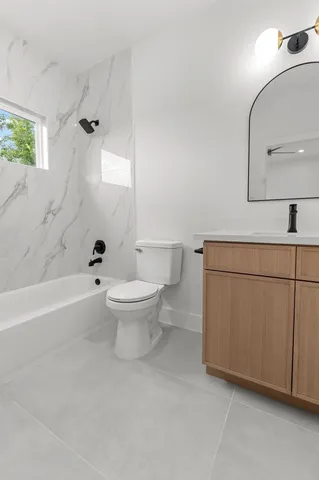 a bathroom with a sink and a toilet