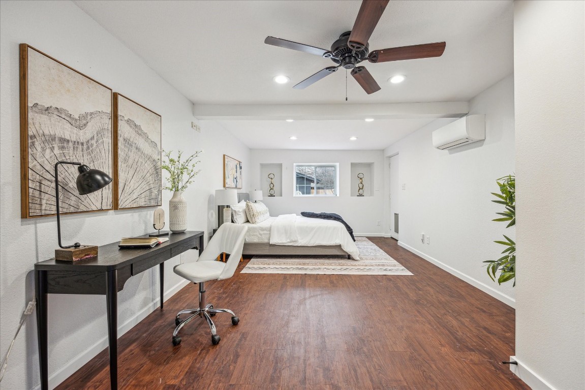 4608 Frontier Trail Austin, TX 78745 - Photo 20 of 30 a view of a workspace with furniture and a window