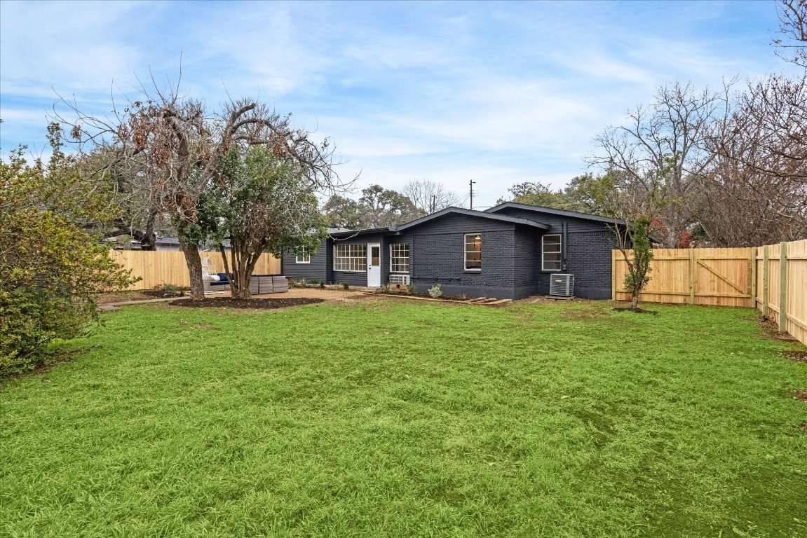 4608 Frontier Trail Austin, TX 78745 - Photo 30 of 30 a view of a house with a yard