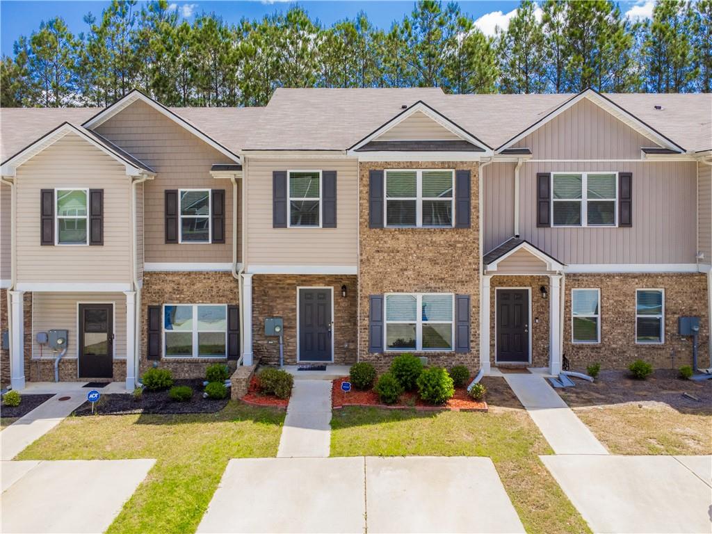 6076 Oakley Road Union City, GA 30291 - Photo 1 of 1 a view of a yard in front of house