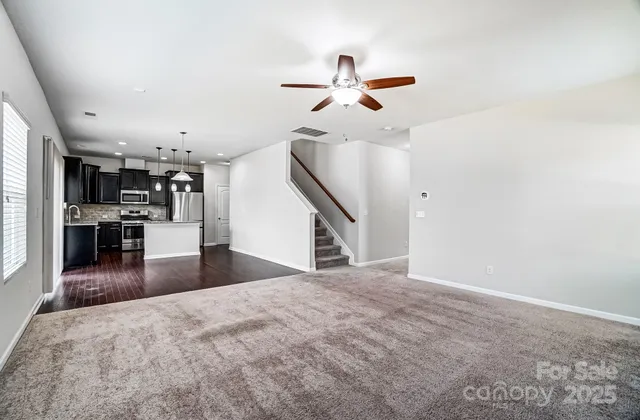 a view of a kitchen and a window